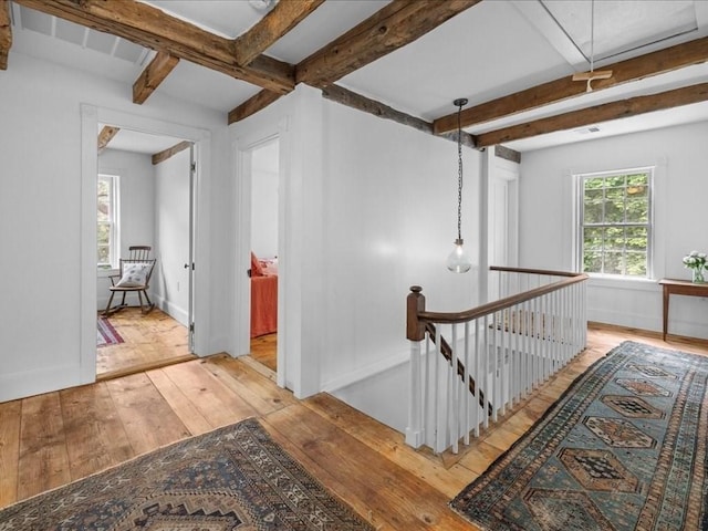 131 Cedar St, Middleboro, MA 02346 - hall with an upstairs landing, light wood-style floors, beamed ceiling, and baseboards
