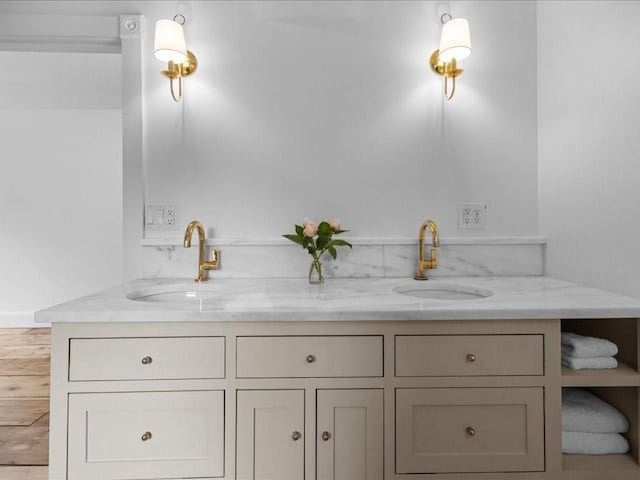 131 Cedar St, Middleboro, MA 02346 - bathroom featuring double vanity and wood finished floors