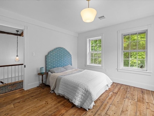 131 Cedar St, Middleboro, MA 02346 - bedroom with wood-type flooring and baseboards