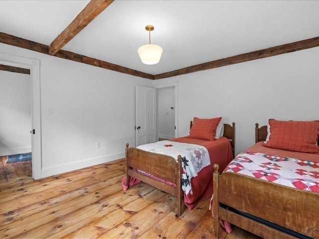 131 Cedar St, Middleboro, MA 02346 - bedroom with hardwood / wood-style floors, beam ceiling, and baseboards