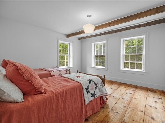 131 Cedar St, Middleboro, MA 02346 - bedroom featuring beam ceiling, light wood finished floors, and baseboards