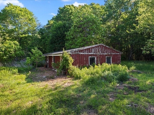 131 Cedar St, Middleboro, MA 02346 - view of yard with a view of trees, an outbuilding, and a pole building