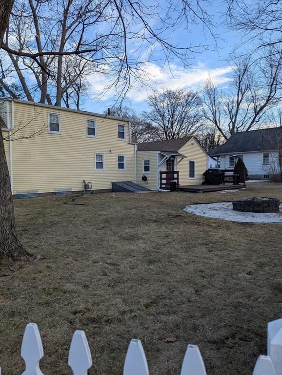 view of yard with a fire pit