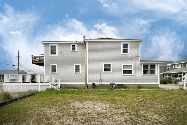 25 11th Rd, Marshfield, MA 02050 - rear view of house with a wooden deck and a yard