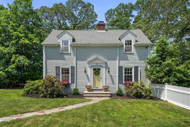 38 Fairmount Rd, Reading, MA 01867 - view of front of house featuring a chimney and roof with shingles
