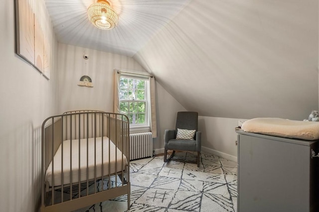 38 Fairmount Rd, Reading, MA 01867 - bedroom featuring vaulted ceiling, radiator heating unit, and a nursery area