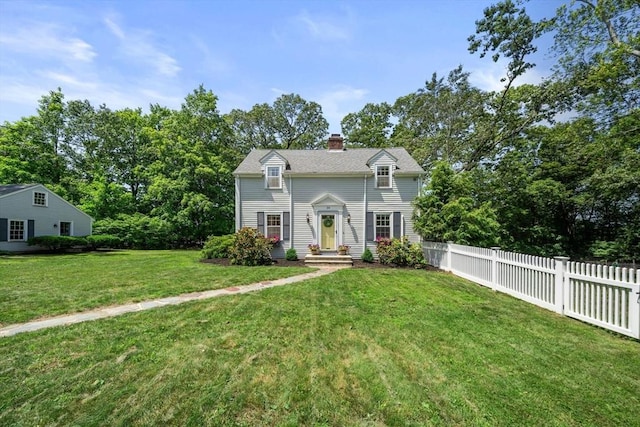 38 Fairmount Rd, Reading, MA 01867 - colonial house with a chimney and view of wooded area