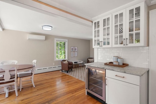 38 Fairmount Rd, Reading, MA 01867 - bar area with beverage cooler, an AC wall unit, backsplash, light wood-type flooring, and ornamental molding