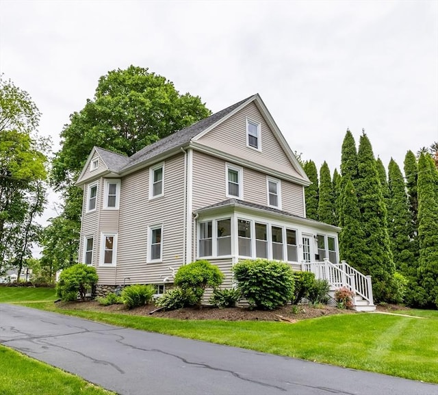 57 Clapp St, Walpole, MA 02081 - view of property exterior with a lawn