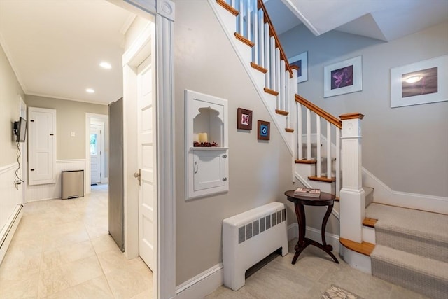57 Clapp St, Walpole, MA 02081 - stairs with radiator heating unit, a baseboard radiator, recessed lighting, a wainscoted wall, and crown molding