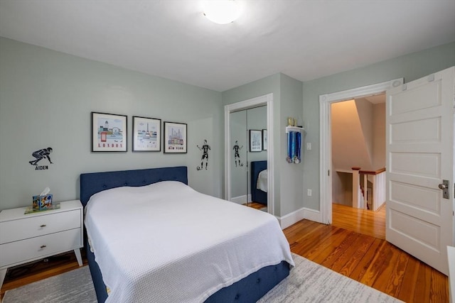 57 Clapp St, Walpole, MA 02081 - bedroom featuring wood finished floors, a closet, and baseboards
