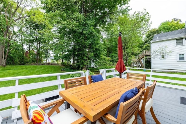 57 Clapp St, Walpole, MA 02081 - wooden terrace with outdoor dining area, a lawn, and view of wooded area
