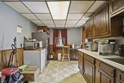 181 W St, Leominster, MA 01453 - kitchen with wood walls