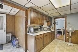181 W St, Leominster, MA 01453 - kitchen featuring wooden walls