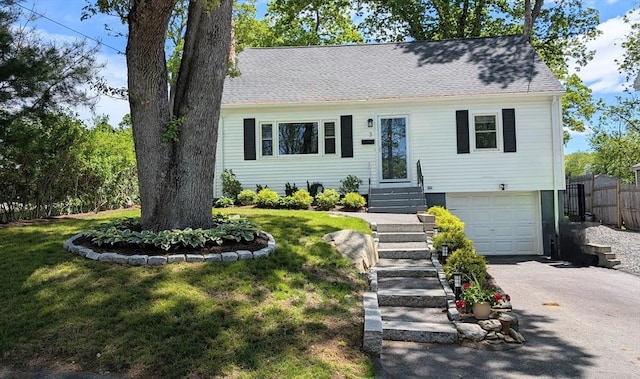 3 Bennett St, Hudson, MA 01749 - view of front of home featuring asphalt driveway, a garage, a shingled roof, and entry steps