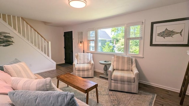 3 Bennett St, Hudson, MA 01749 - living room featuring wood finished floors, stairs, and baseboards