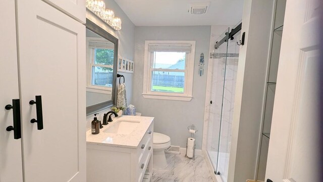3 Bennett St, Hudson, MA 01749 - full bathroom featuring a stall shower, marble finish flooring, toilet, vanity, and baseboards