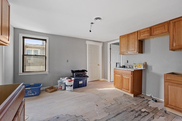 kitchen with light wood-type flooring