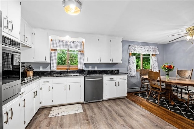 9 Lillian Rd, Acton, MA 01720 - kitchen with appliances with stainless steel finishes, a sink, plenty of natural light, and light wood-style flooring