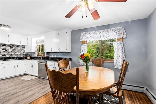 9 Lillian Rd, Acton, MA 01720 - dining space featuring wood finished floors, a baseboard radiator, and ceiling fan