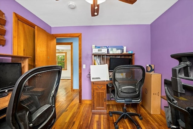 9 Lillian Rd, Acton, MA 01720 - office area with a ceiling fan, wood finished floors, baseboards, and a baseboard heating unit