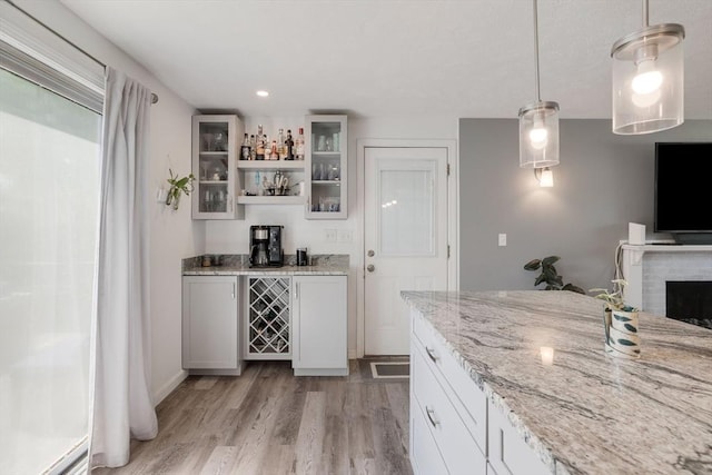 853 Sandwich, Falmouth, MA 02536 - indoor dry bar with light wood finished floors, decorative light fixtures, and recessed lighting