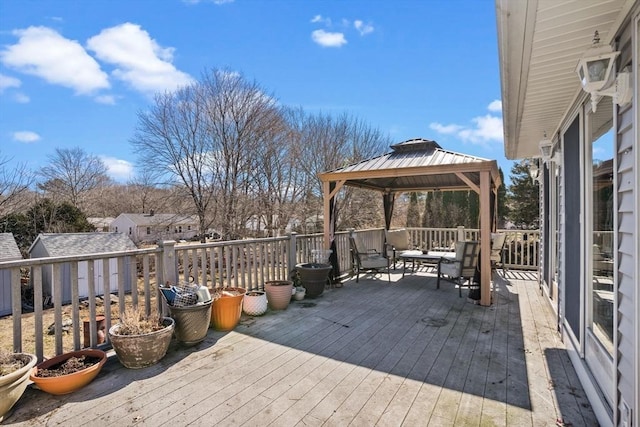 wooden terrace with a gazebo