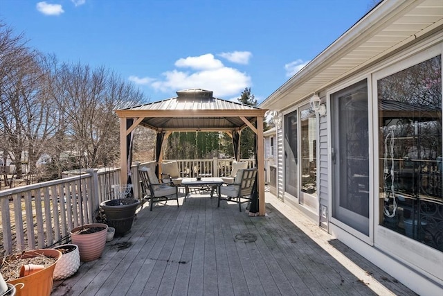 wooden terrace with a gazebo