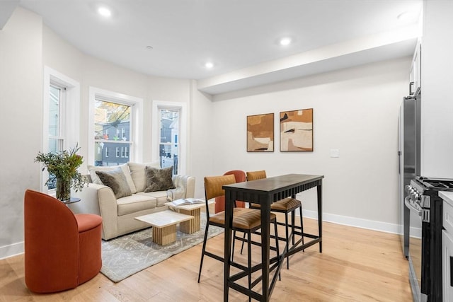 living room featuring light wood-type flooring