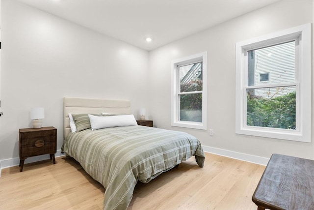 bedroom featuring light hardwood / wood-style flooring