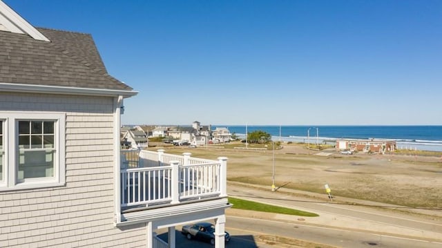 property view of water featuring a beach view