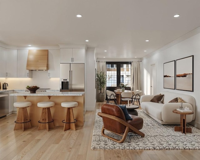 9 Sydney St Unit 2, Boston, MA 02125 - living room featuring recessed lighting, light wood finished floors, and crown molding