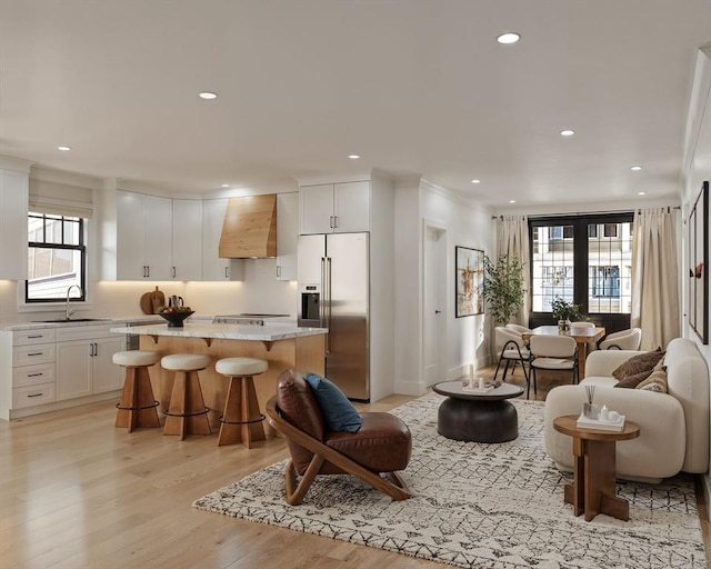 9 Sydney St Unit 2, Boston, MA 02125 - living room featuring recessed lighting, light wood-type flooring, and healthy amount of natural light