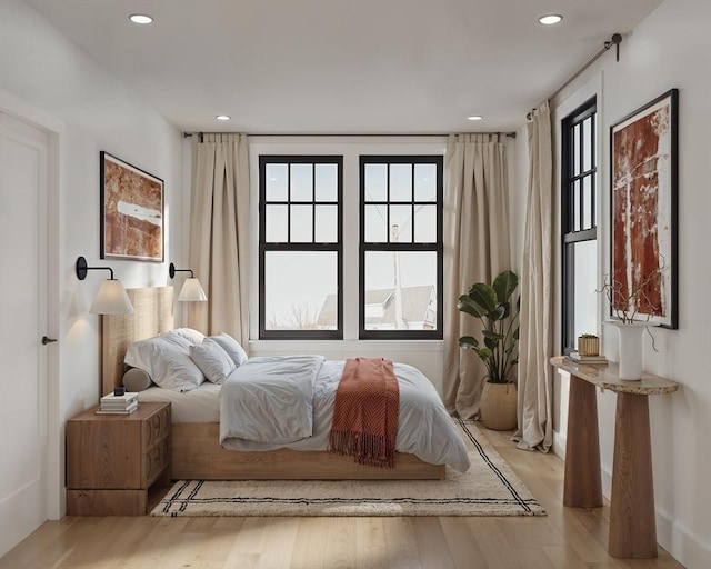 9 Sydney St Unit 2, Boston, MA 02125 - bedroom with wood finished floors and recessed lighting