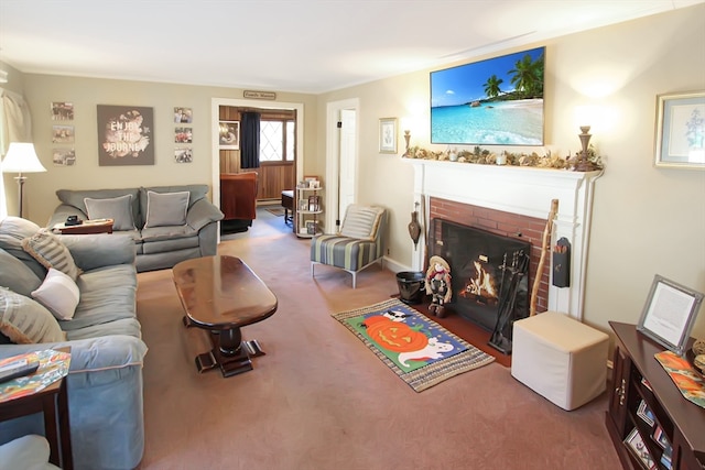 carpeted living room with a brick fireplace