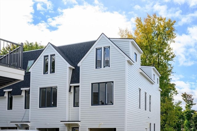 rear view of house with a balcony