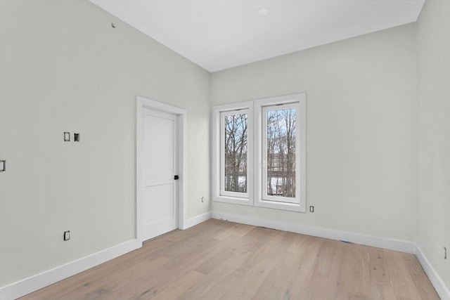 empty room with light wood-type flooring