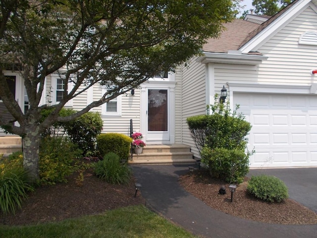 38 Stonebridge Dr Unit 38, Hanson, MA 02341 - property entrance with roof with shingles
