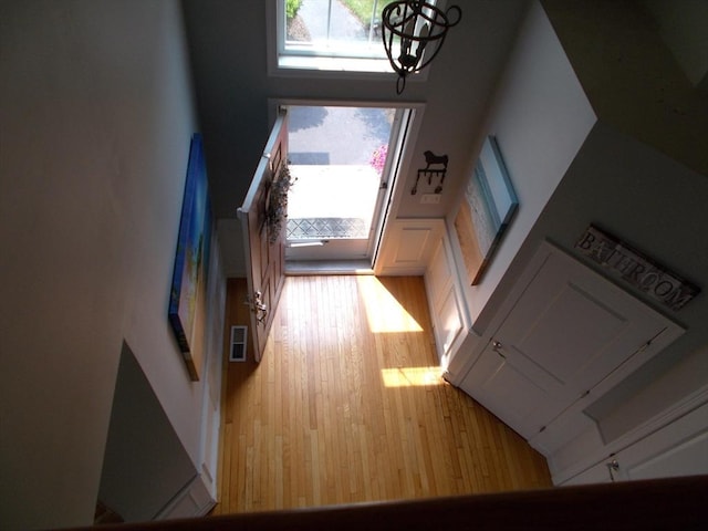 38 Stonebridge Dr Unit 38, Hanson, MA 02341 - interior space featuring a chandelier, wood finished floors, and a towering ceiling