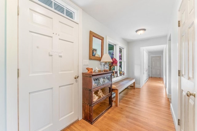 56 Bridle Path, Tisbury, MA 02567 - hallway with light wood-type flooring and baseboards
