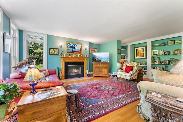 56 Bridle Path, Tisbury, MA 02567 - living room with wood finished floors and a fireplace with flush hearth