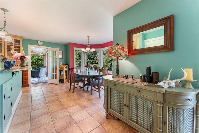 56 Bridle Path, Tisbury, MA 02567 - dining room with a chandelier