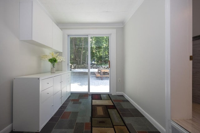 14 Adams Rd, Ashland, MA 01721 - doorway featuring crown molding and dark stone finish floors