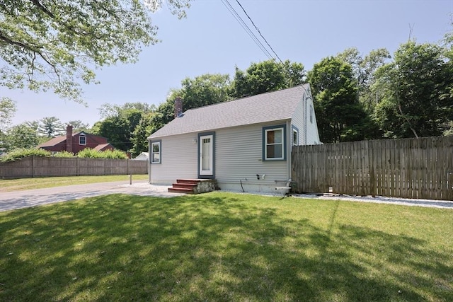 14 Adams Rd, Ashland, MA 01721 - bungalow-style house featuring a fenced backyard, a patio area, and a chimney