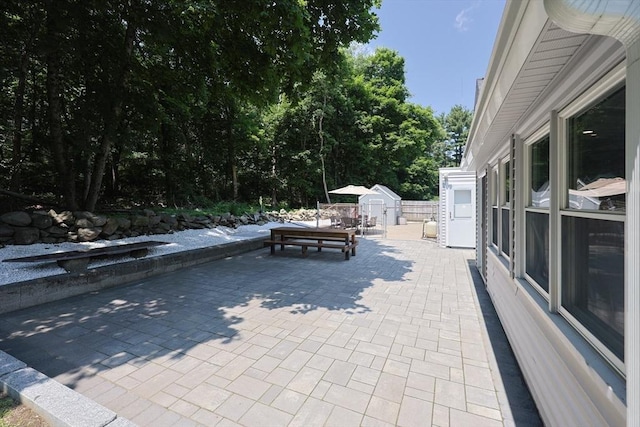 14 Adams Rd, Ashland, MA 01721 - view of patio featuring a shed