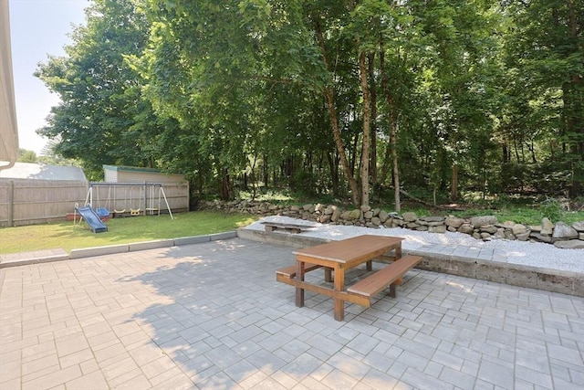 14 Adams Rd, Ashland, MA 01721 - view of patio featuring a playground and outdoor dining area