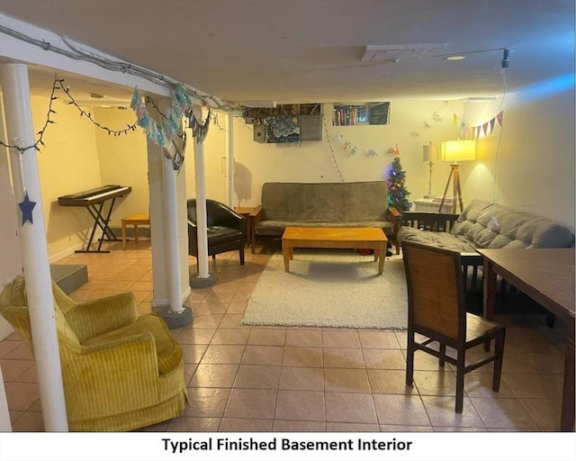 finished basement with tile patterned floors and electric panel