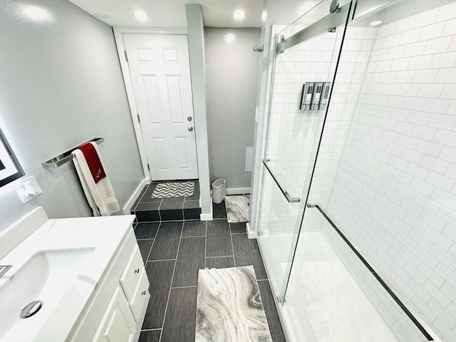 38 Thayer Ave, Whitman, MA 02382 - bathroom featuring a shower stall, vanity, and recessed lighting