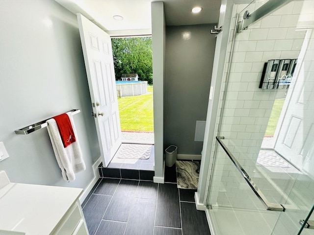 38 Thayer Ave, Whitman, MA 02382 - full bathroom featuring a shower stall, baseboards, and toilet
