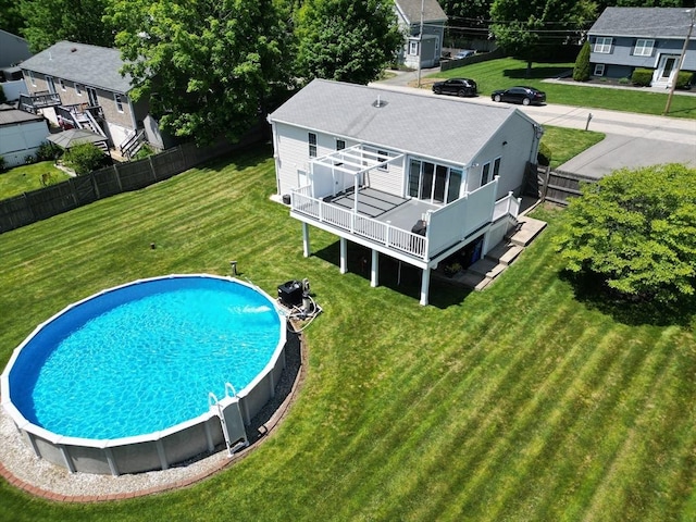 38 Thayer Ave, Whitman, MA 02382 - rear view of property with a wooden deck and roof with shingles